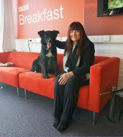 Fay keeping Barney calm while he waits for his starring role on the BBC World Service in Cooking For Dogs