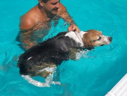 With Zbig helping to support her in the water.