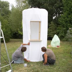 We were invited to have a booth at the "It's Me Or The Dog" section of the 2006 Wag & Bone Show in Windsor. We thought about creating an ice cream parlour, and, in the end, decided on a large ice cream cone. The ice cream (foam) is in the background, while Zbig and Greg fix the "skin" on our cone.
